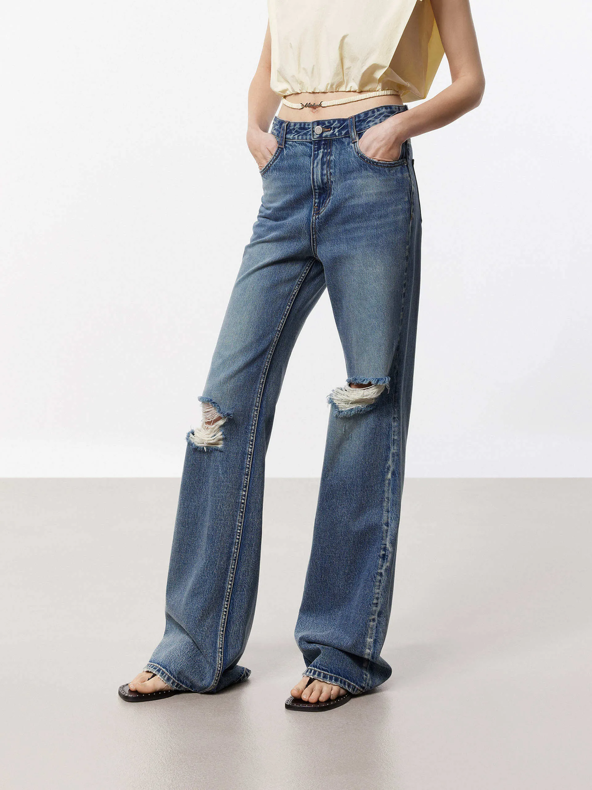 Ripped Detail Flared Jeans