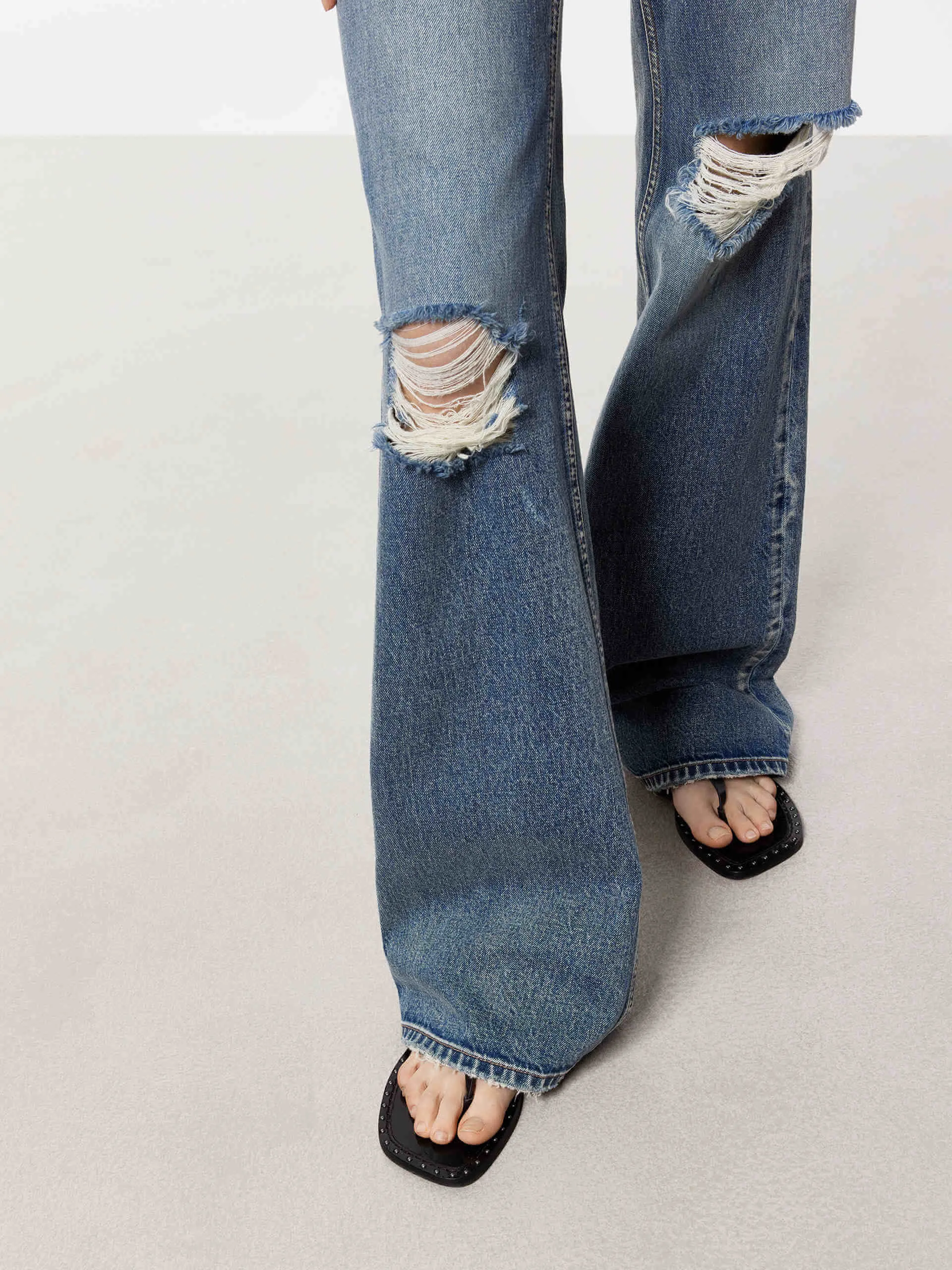 Ripped Detail Flared Jeans