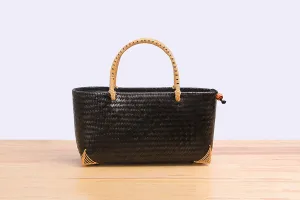 Woven bamboo handbag