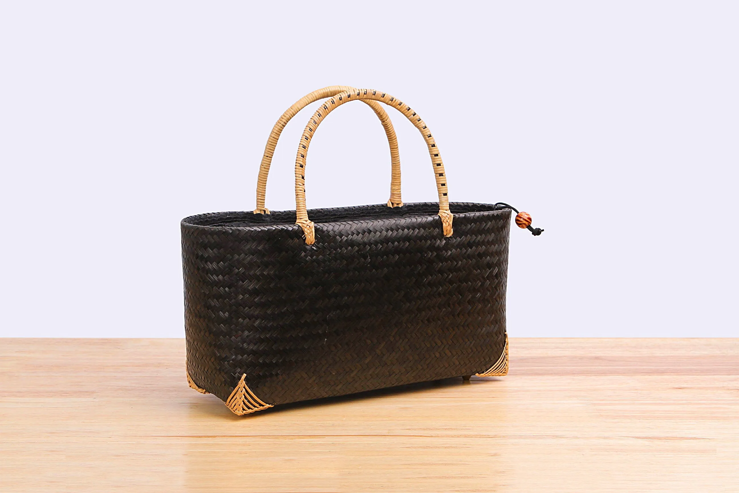 Woven bamboo handbag